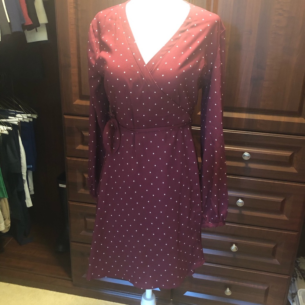 Burgundy wrap dress with star design